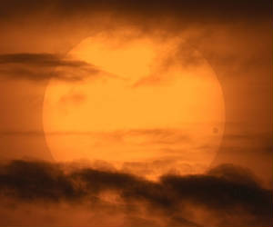 Observe the transit of Venus in front of our Helios - the same will happen in 2012