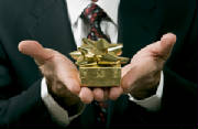 Visiting it is Normal to take a Gift that you give with two hands holding it.